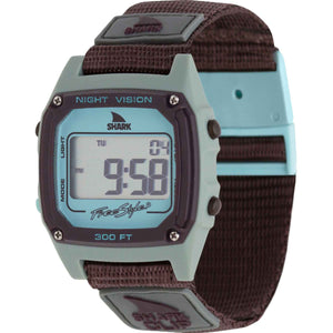 Freestyle SHARK CLASSIC CLIP GREY/BLUE digital watch, square face with numbers displayed, brown fabric strap.
