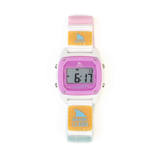 Freestyles SHARK CLASSIC LEASH watch with a blue tie-dye design: digital display, pink face, multicolor strap indicating the time as 6:17.