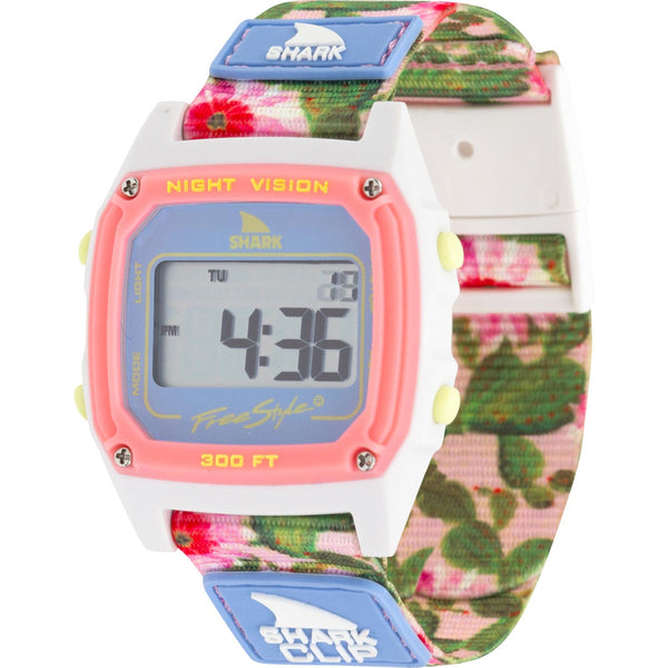 Freestyle Shark Classic digital watch with Prickly Pear Pink floral strap, blue SHARK logo, and precision fit.