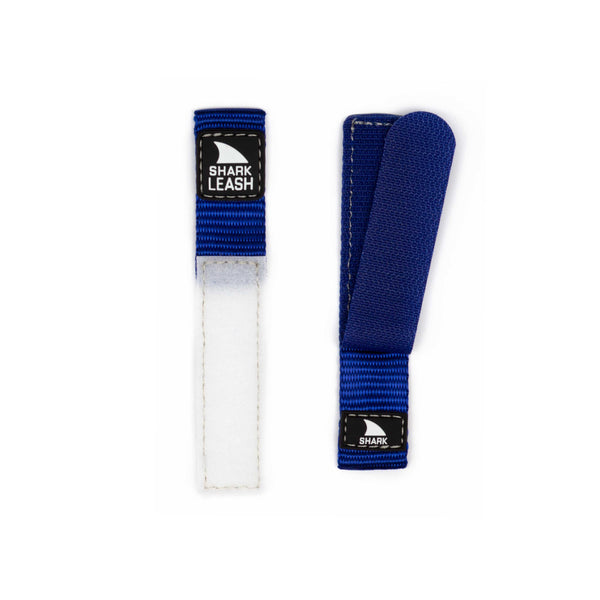 Two blue-and-white velcro straps, labeled APPLE WATCH™ LEASH STRAP COBALT, shown front and back on a white background.