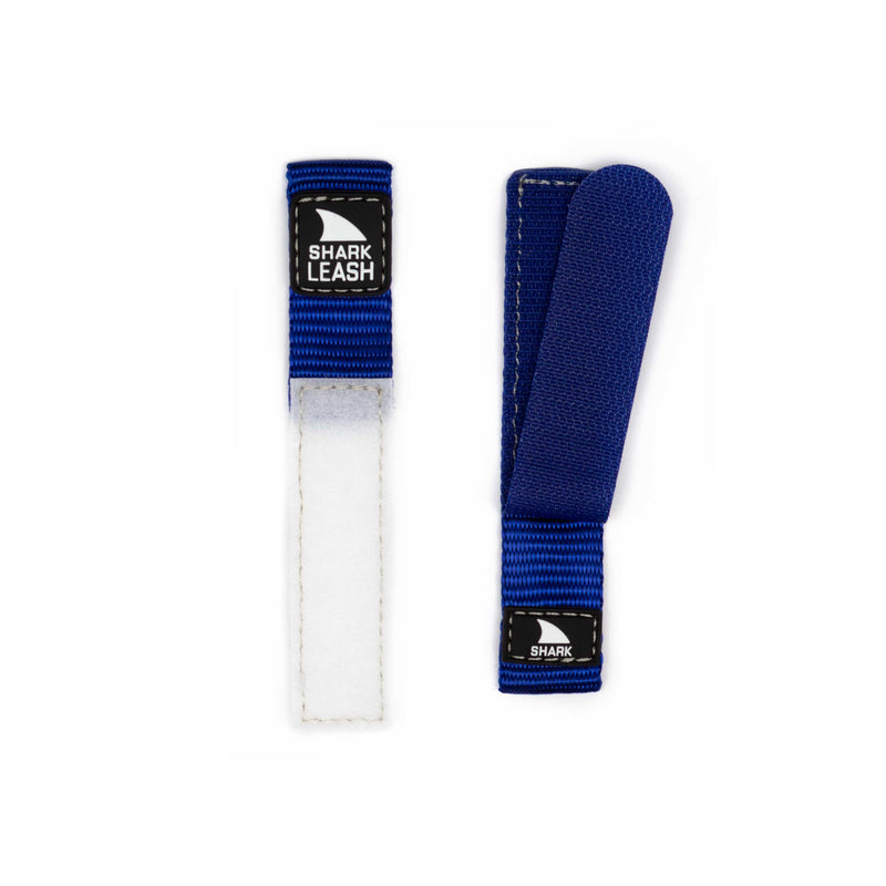 Two Freestyle STRAP KIT - LEASH - COBALT straps with black logo patches, one displayed open to reveal a white Velcro closure.