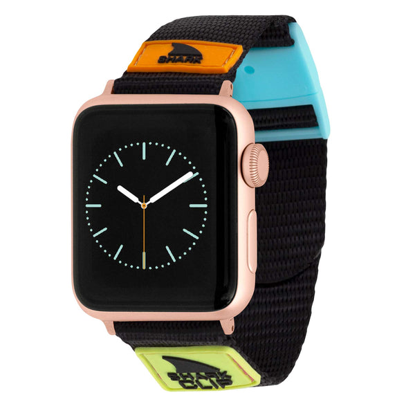 APPLE WATCH™ CLIP STRAP NEON BLACK by Freestyle: Rose gold case, black face, Shark Clip Strap with orange, blue, green accents.