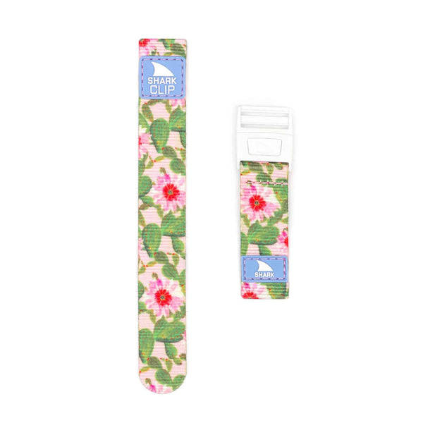 Two Freestyle Shark Classic Prickly Pear Pink clip straps with floral designs and blue SHARK CLIP tags.