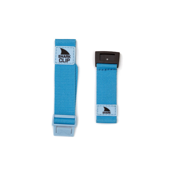 Two Freestyle Shark Classic Clip Strap Kits: one in light blue and black, the other entirely light blue, each featuring a distinctive clip closure.
