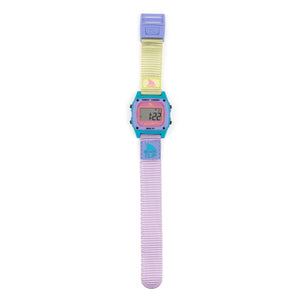 The Freestyle SHARK CLASSIC CLIP LAVENDER TEA watch features pastel colors with a pink face and blue bezel.