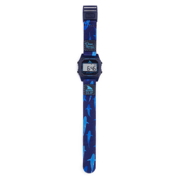 The Freestyle Ocean Ramsey Signature Shark Classic Clip Deep Blue watch has a shark silhouette blue band and a digital display.