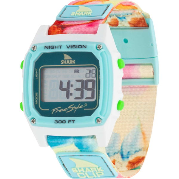 Freestyle Sage Erickson Shark Classic Clip watch with a floral strap and turquoise face showing the time 4:39 and FR 32.
