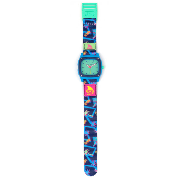Freestyle SHARK CLASSIC CLIP ANALOG MALIBLU: turquoise case, palm tree strap, water-resistant accessory.