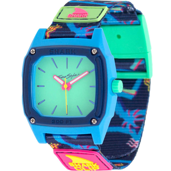 The Freestyle SHARK CLASSIC CLIP ANALOG MALIBLU features a vibrant blue face, neon accents, and a water-resistant patterned strap.