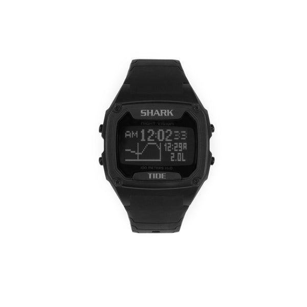 The Freestyle SHARK XL TIDE 600 BLACK displays current details, calendar information, and tide graph; classic watch shown on white background.
