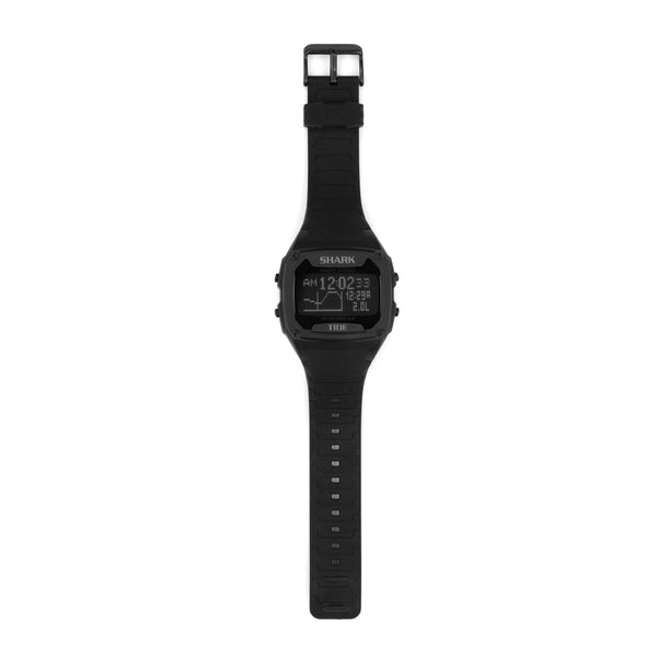 The Freestyle SHARK XL TIDE 600 BLACK is a digital watch featuring a rectangular face, adjustable strap, and tide height indicator.