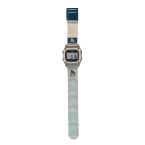 Freestyle SHARK CLASSIC CLIP COOL SHORE: rectangular digital watch with cream and teal strap, featuring retro Shark Clip branding.