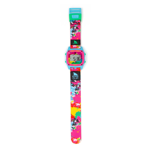Freestyle SHARK CLASSIC CLIP NEON SPLATTER watch with colorful clip band, turquoise frame, displays 5:36.