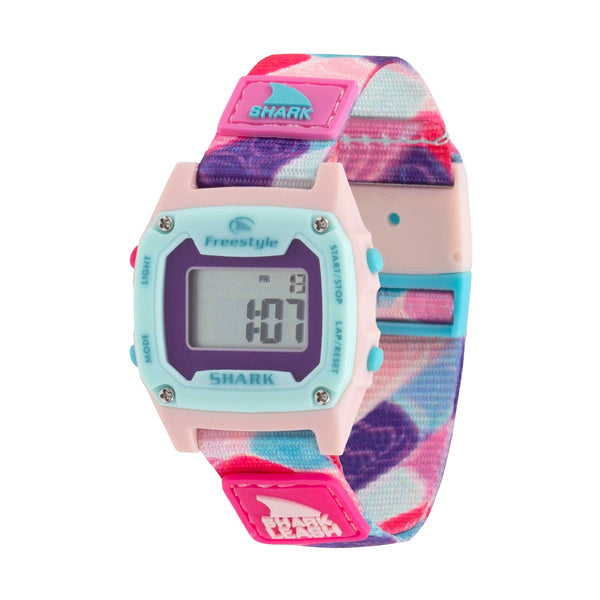 Freestyle SHARK MINI CLIP PIXIE CHIPS digital watch with pink, blue, and purple band and rectangular 1:07 display.