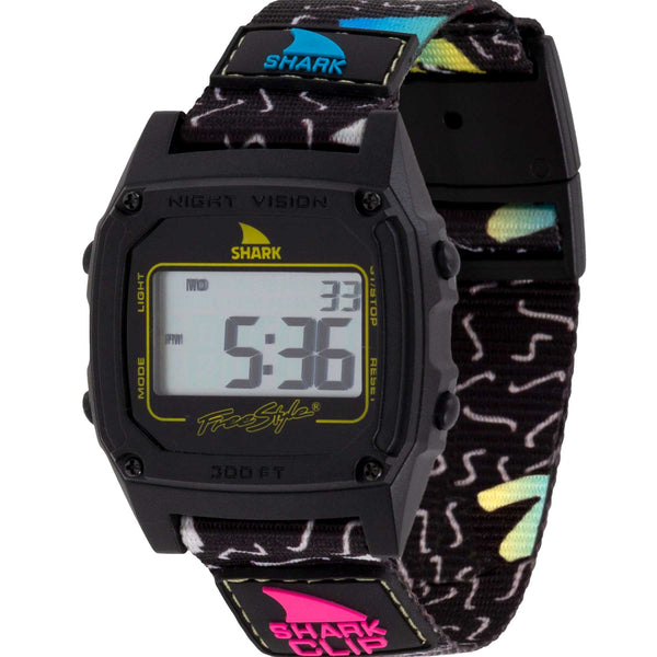 Freestyle SHARK CLASSIC CLIP NEW WAVE: digital watch with black face, retro strap, and 5:36 display.
