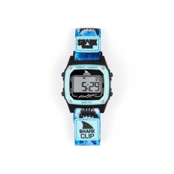 Limited edition Freestyle SHARK CLASSIC CLIP SHARK WEEK MEGA BREACH with blue strap and rectangular face, display lit on the screen.
