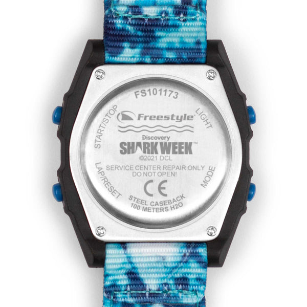 Back of Freestyle SHARK CLASSIC CLIP SHARK WEEK MEGA BREACH with water resistance details, blue Shark Watch strap visible.