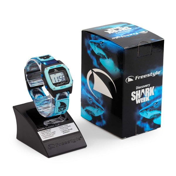 Freestyle SHARK CLASSIC CLIP SHARK WEEK MEGA BREACH Watch featuring SHARK WEEK graphics, themed box, and display stand.