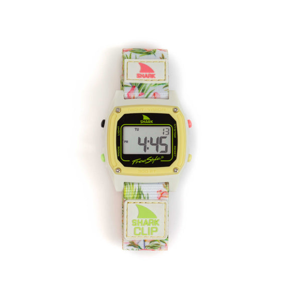 Freestyle SHARK CLASSIC CLIP PLUMERIA: digital watch featuring a white floral strap and a yellow bezel.