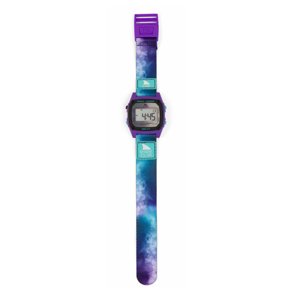 The image shows the Freestyle Amber Torrealba Signature Shark Classic Clip Reflection watch with a cosmic blue face and silver mirror-finished lens.