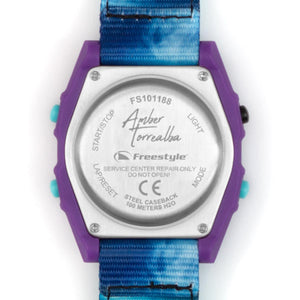 Back of Freestyle Shark Classic Clip Reflection featuring a blue strap, purple case, and Amber Torrealba’s signature.