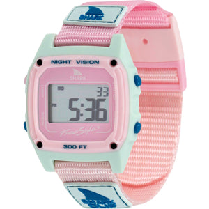 The Freestyle Sage Erickson Shark Classic Clip watch features blue, pink, and white colors with a fabric band and blue buttons.