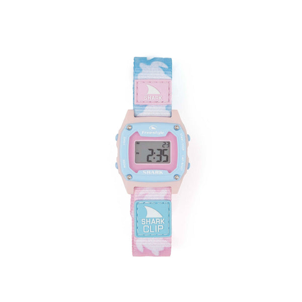 A Freestyle SHARK MINI CLIP TRIPPY TURTLE wristwatch with a pastel blue and pink camo strap features numbers on its digital display.