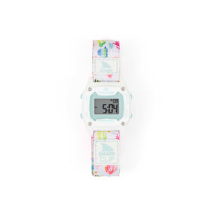 The Freestyle SHARK MINI CLIP REEF LIFE is a digital watch with a colorful strap, clip band, and numbers shown on the display.