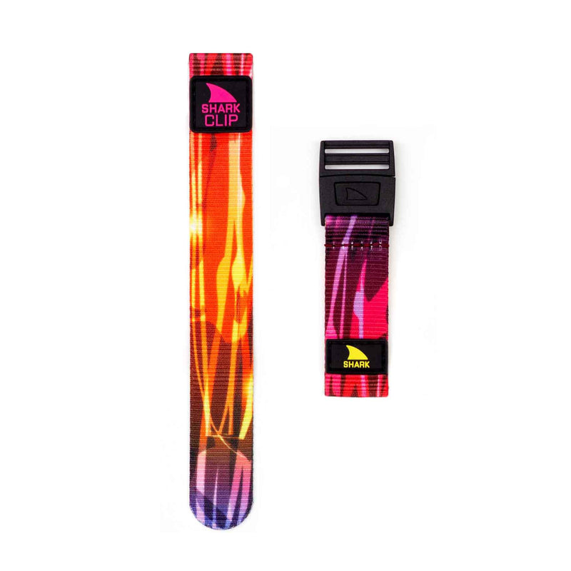 Two vibrant Freestyle STRAP KIT - CLIP - FIRE RED/YELLOW watch straps featuring abstract patterns and clip closures.
